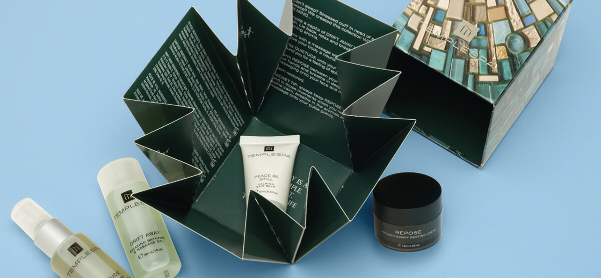 WITH YOU IN MIND showing an open box with 4 products inside